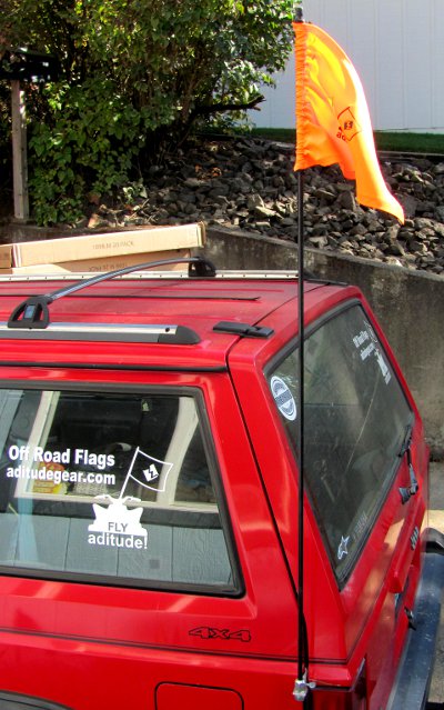High Visibility orange flag on Jeep Cherokee